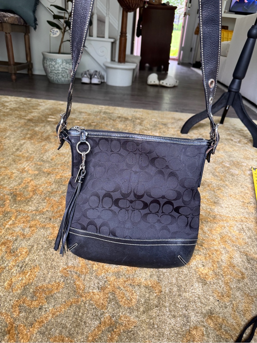 Coach Black Signature Crossbody with Tassel Charm